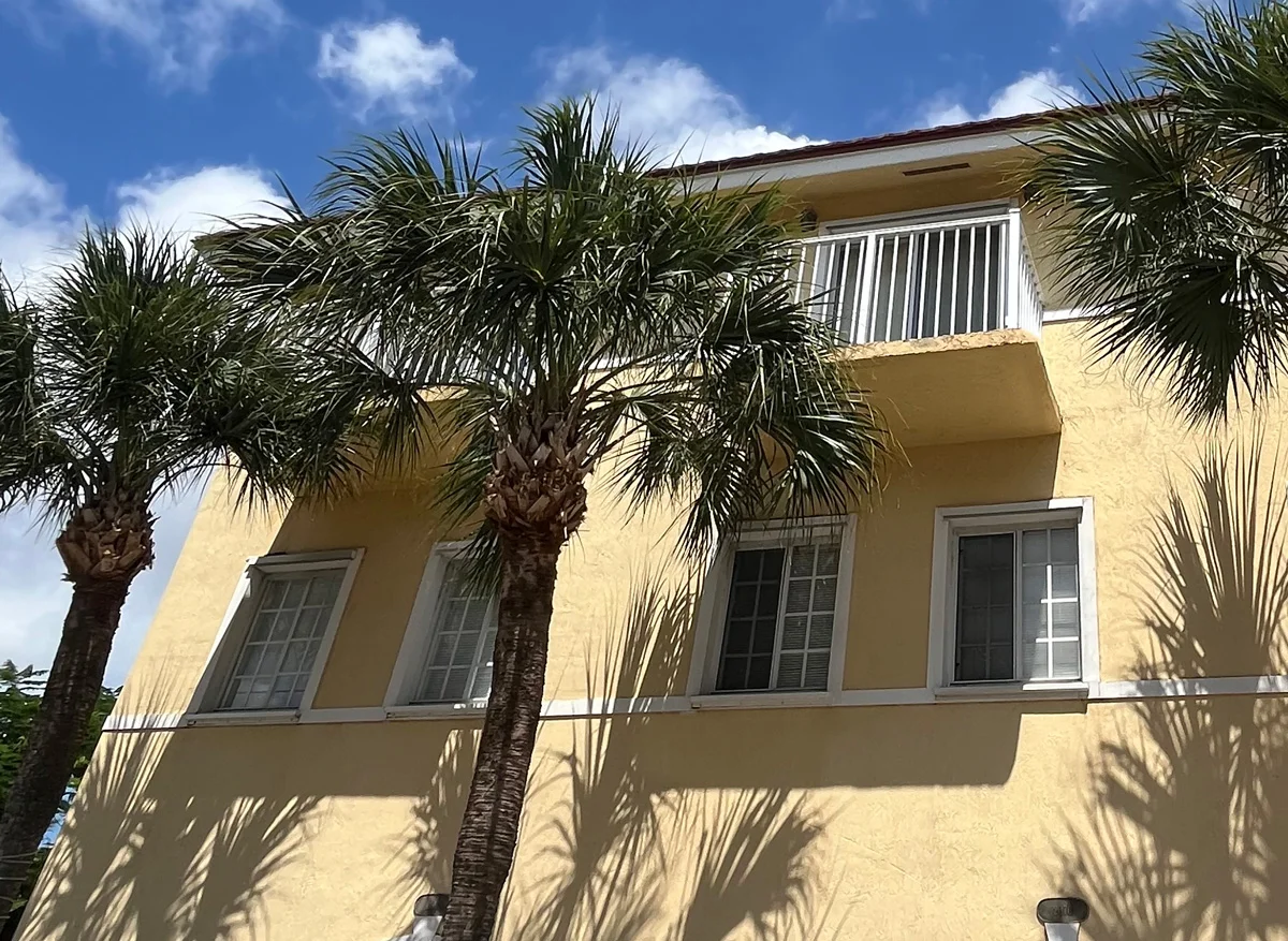 Clean building exterior after pressure washing